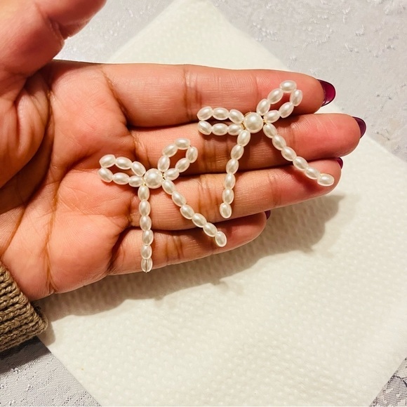 Anthropologie Jewelry - Pearl bead bow tie earrings